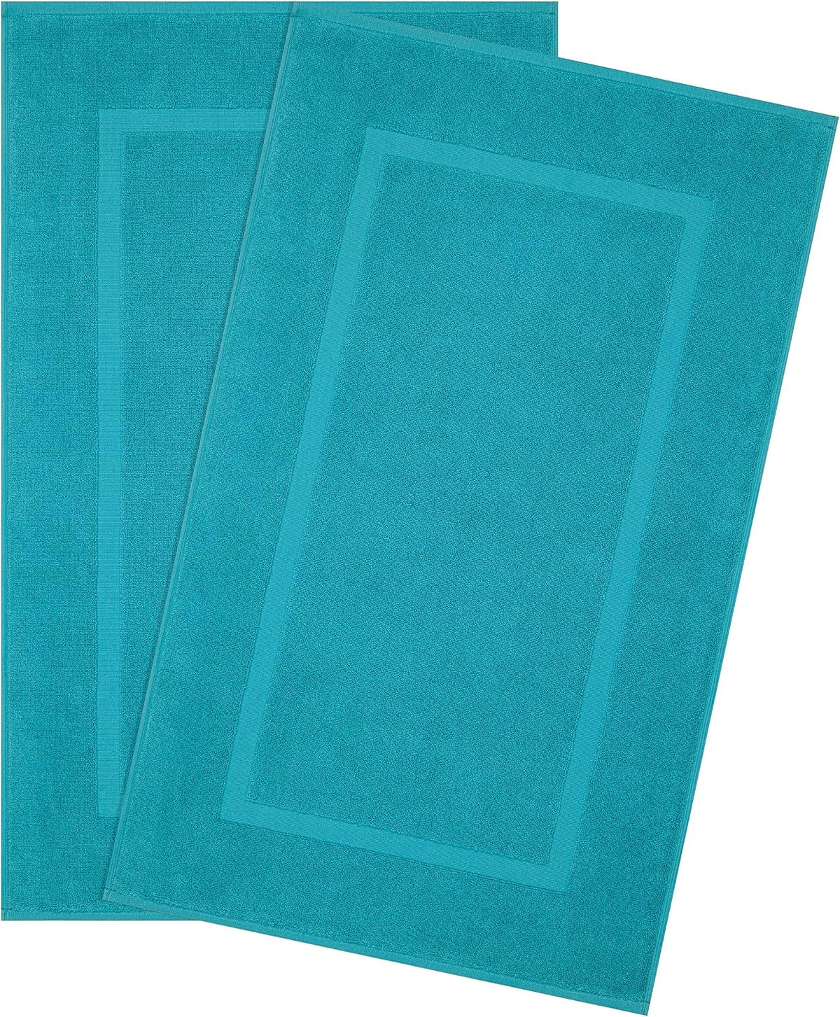 Two teal rectangular bath mats laid overlapping showing a bordered design.