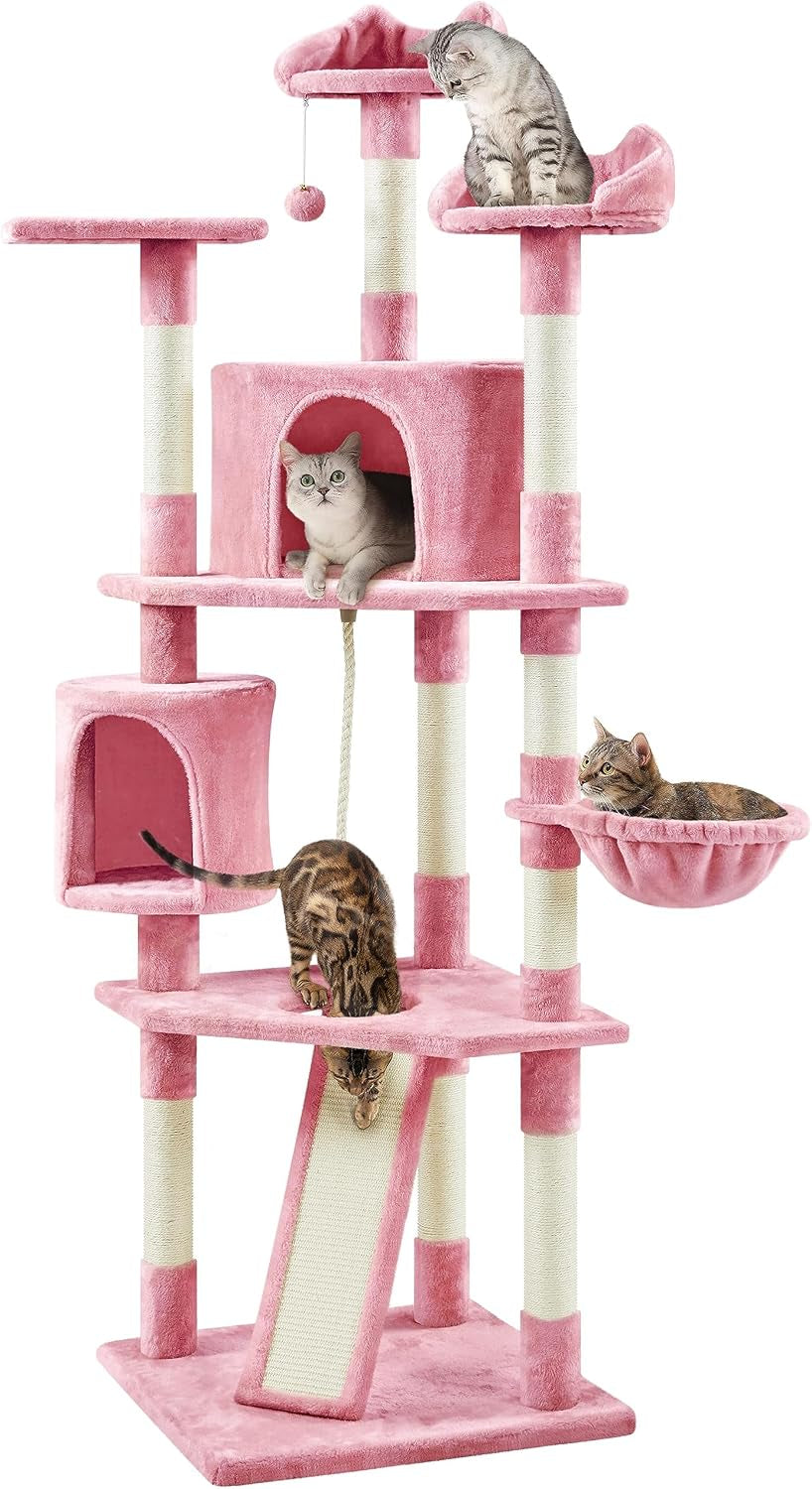 Tall pink multi-level cat tree with condos, hammock, ramp, sisal-wrapped posts and several cats.