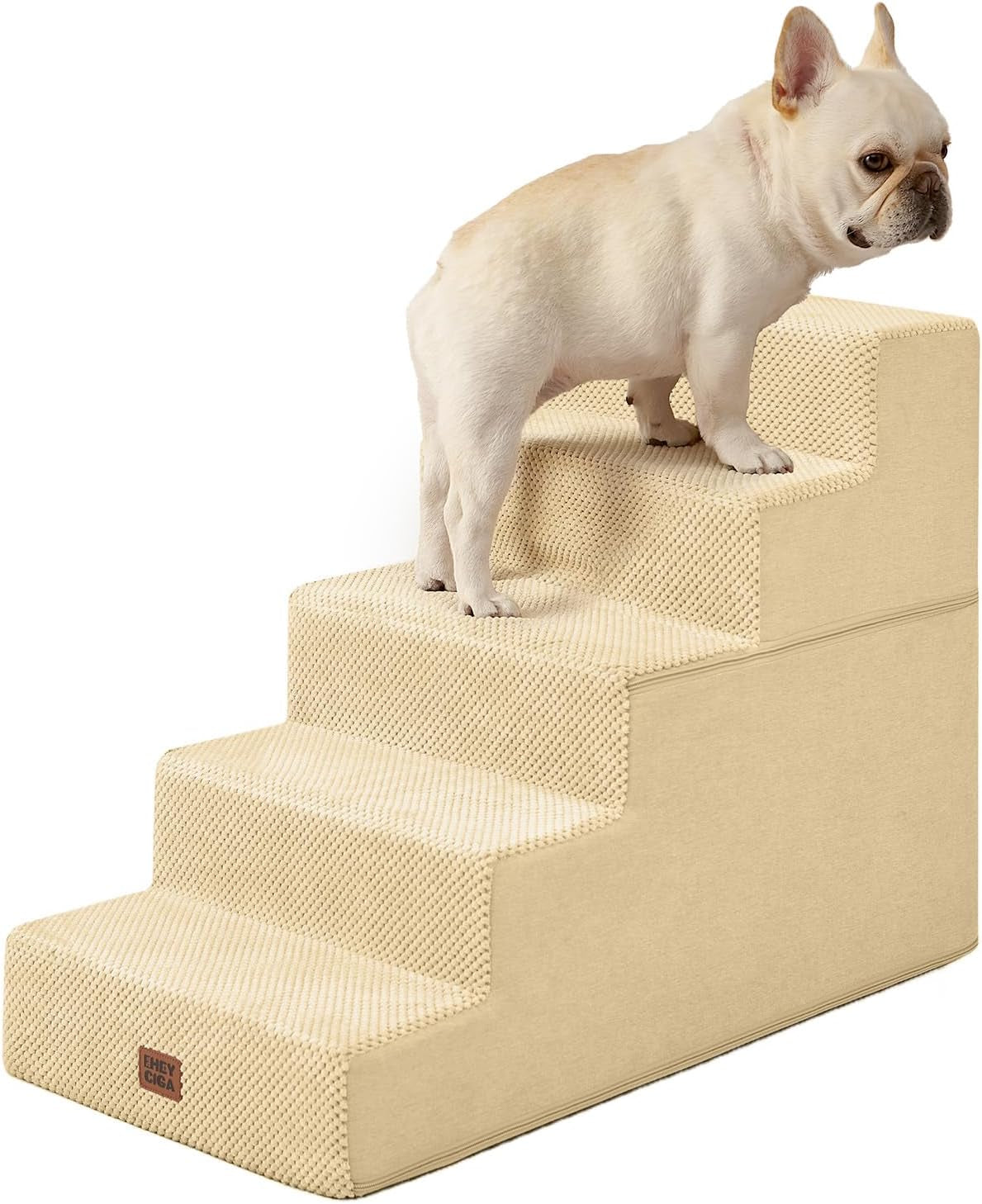 Side-profile of cream-colored four-step stairs with a French bulldog standing on the second-highest step.