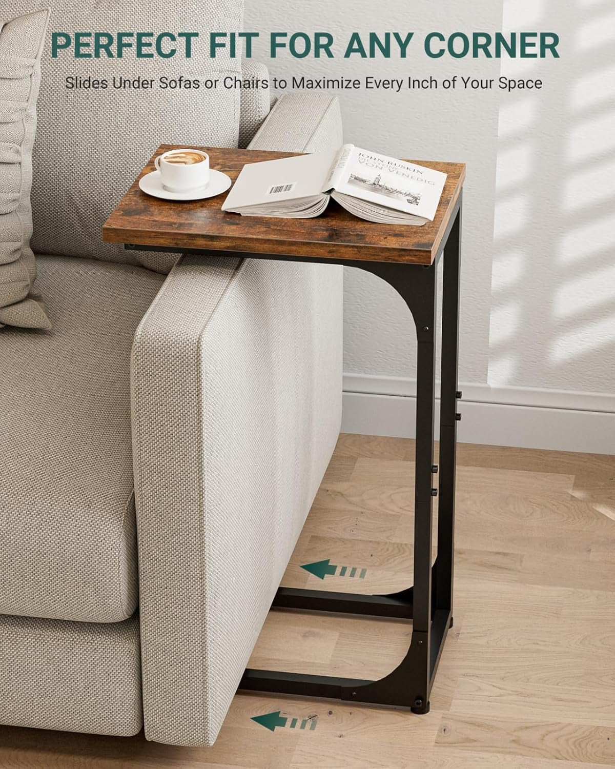 Side view of the table slid over a sofa arm showing the base sliding under seating