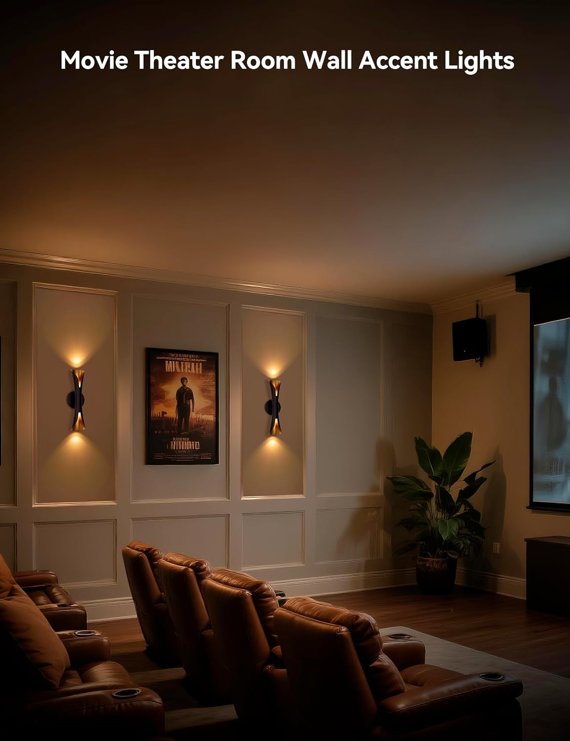 Three black-and-gold up-and-down wall sconces illuminating a home theater room wall with seating.