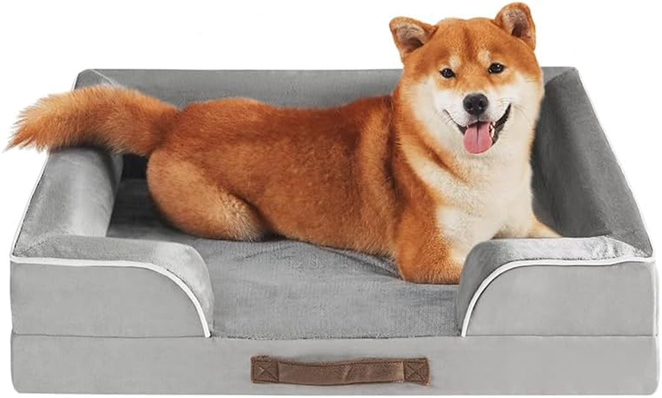 Gray bolster pet couch photographed head-on with a smiling Shiba Inu sitting inside and tail draped over the side.