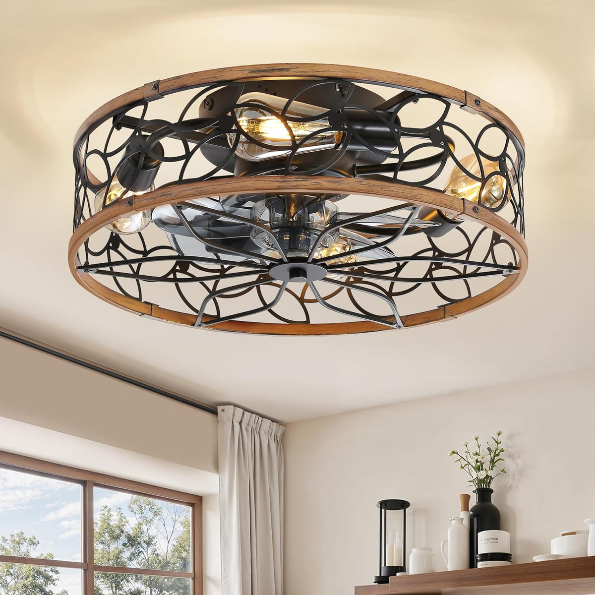 Ceiling-mounted round caged fan with decorative metal lattice and wood trim in a living area.