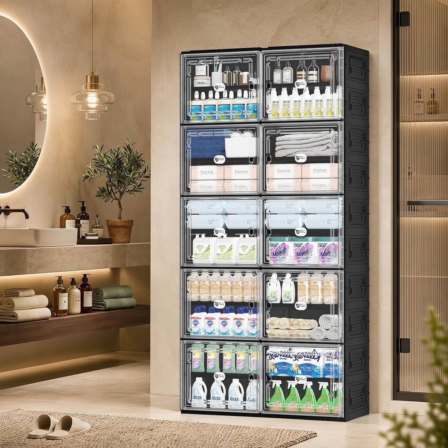 Tall black modular shoe cabinet with clear magnetic doors placed in a styled bathroom entryway.