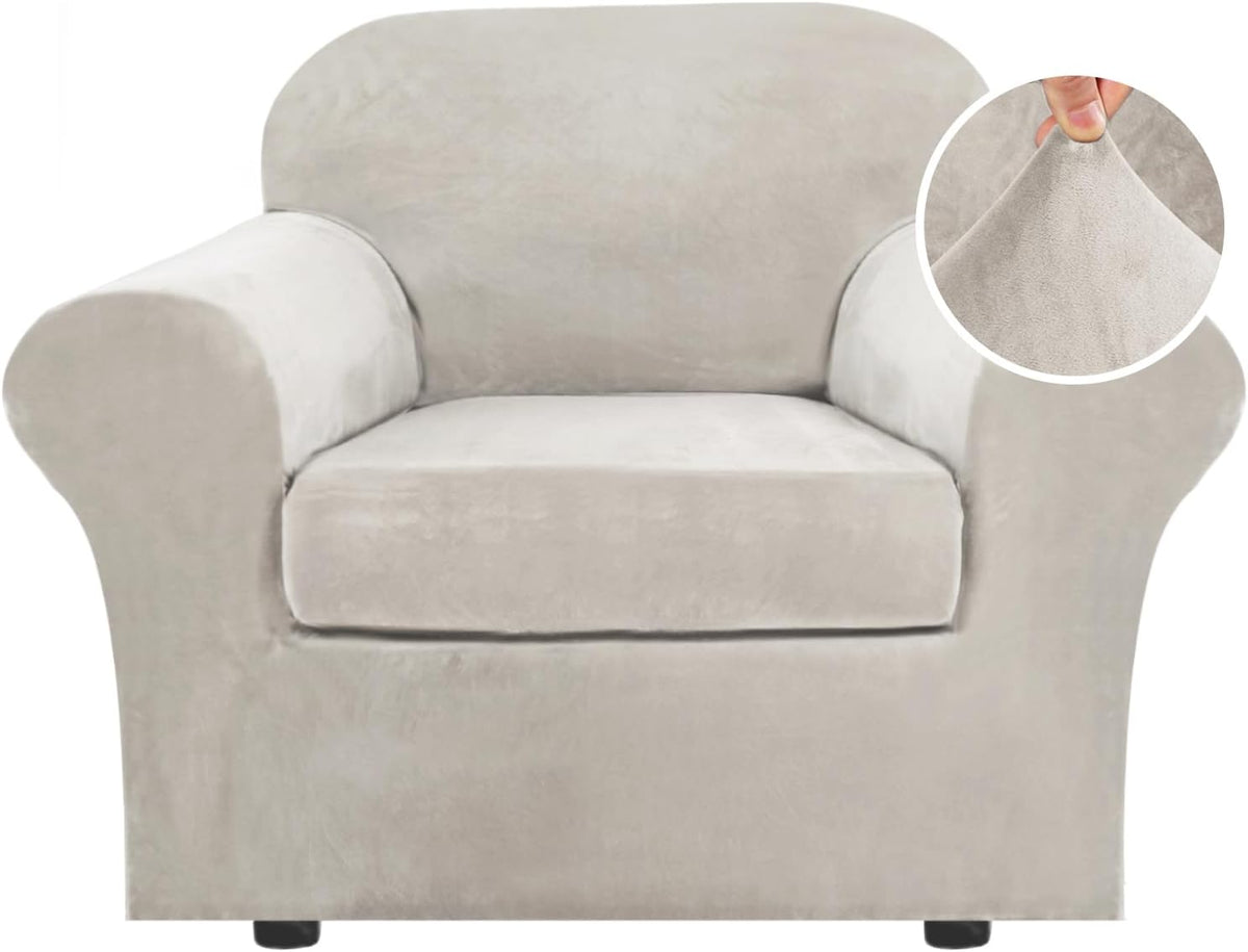 Front view of a light gray armchair slipcovered in plush stretch fabric with inset showing fabric pull.
