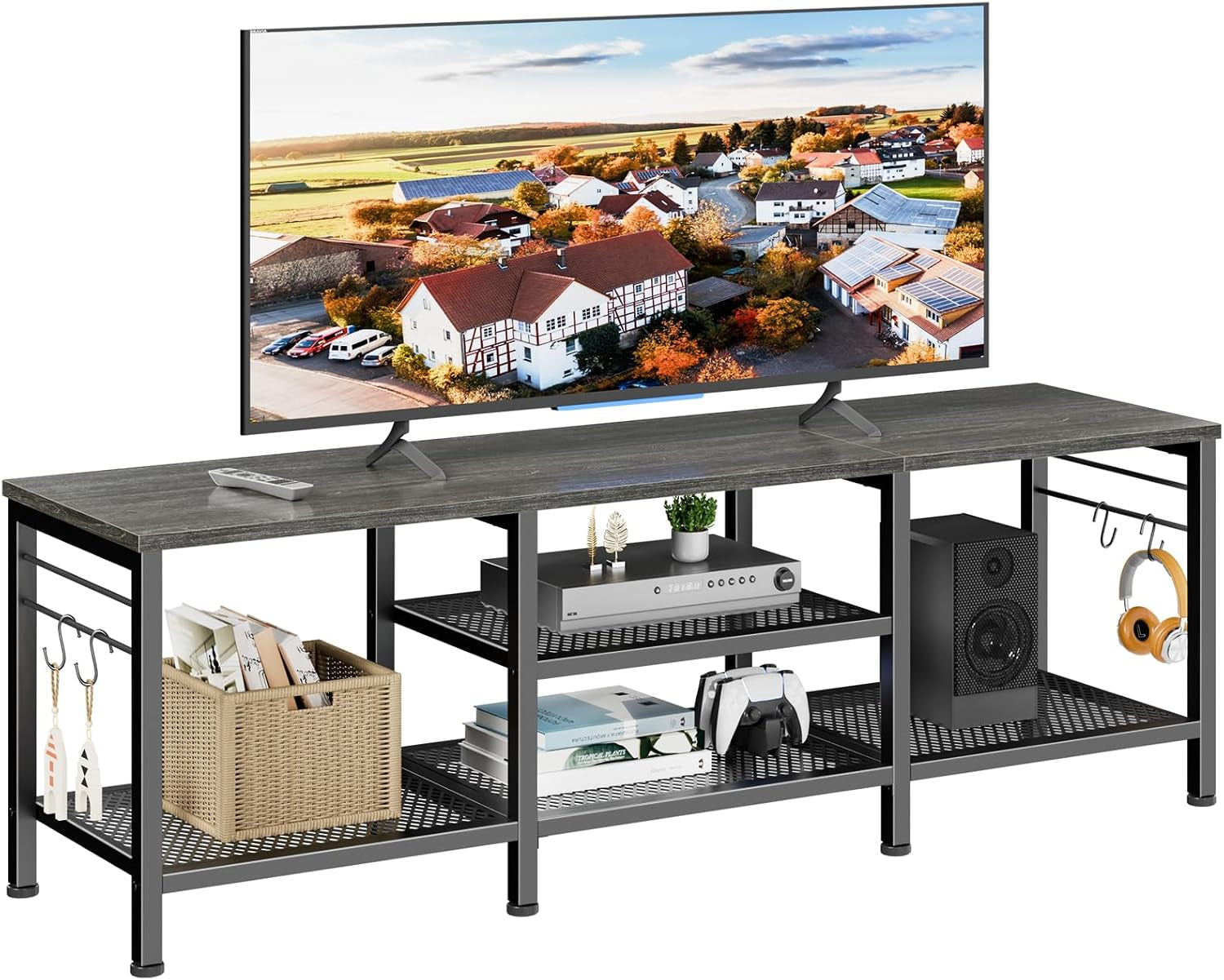 Angled studio view of dark gray-topped metal TV console showing mesh lower shelves and side hooks.