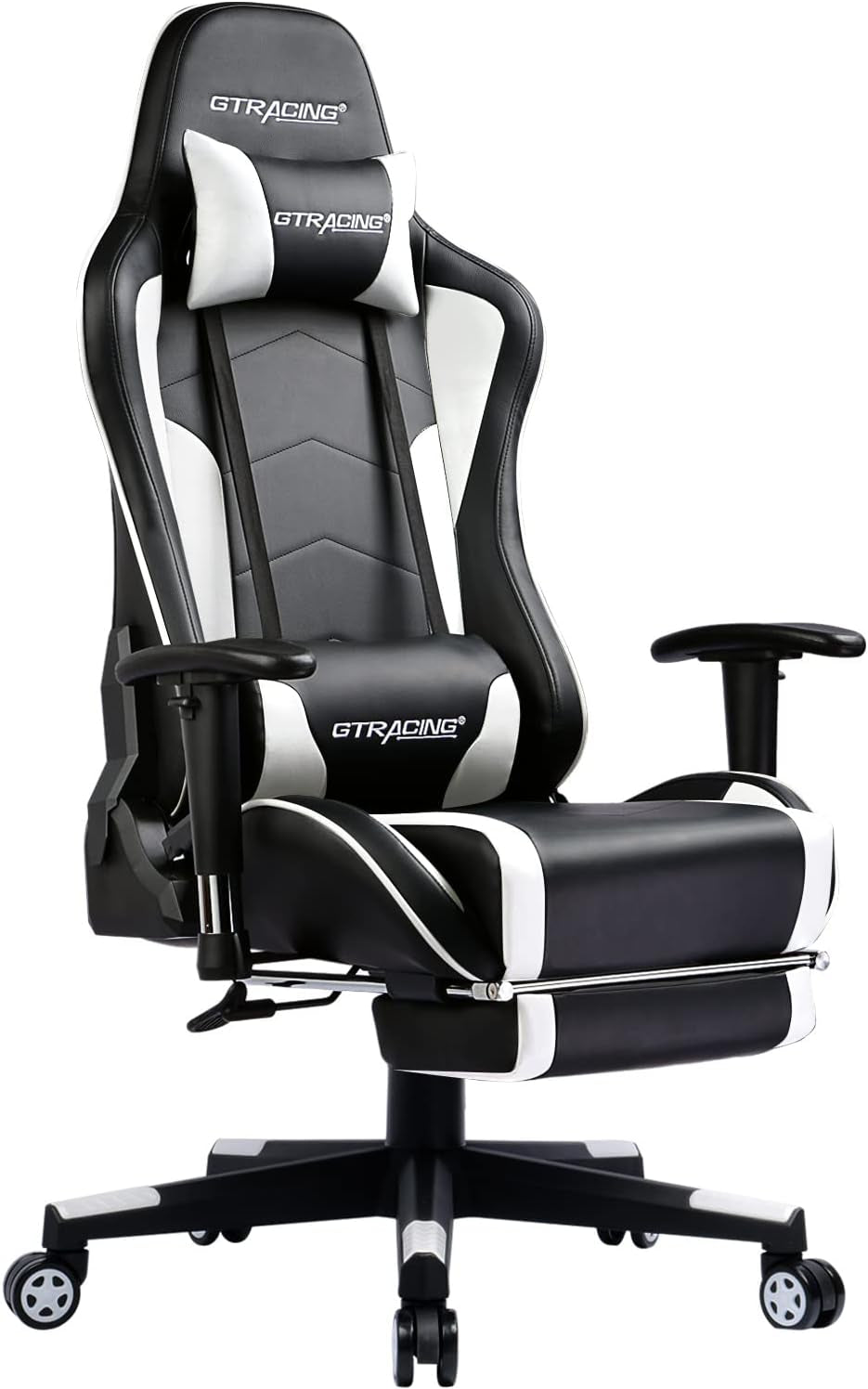 Black and white gaming chair shown angled right with head and lumbar pillows and footrest pulled out.
