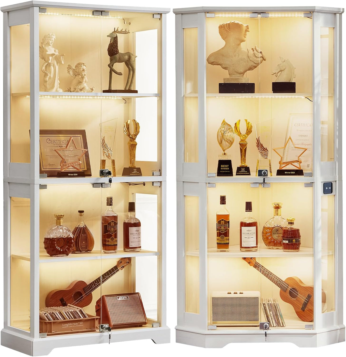 Pair of white glass-front display cabinets side by side, each lit and showing trophies, bottles and a guitar.