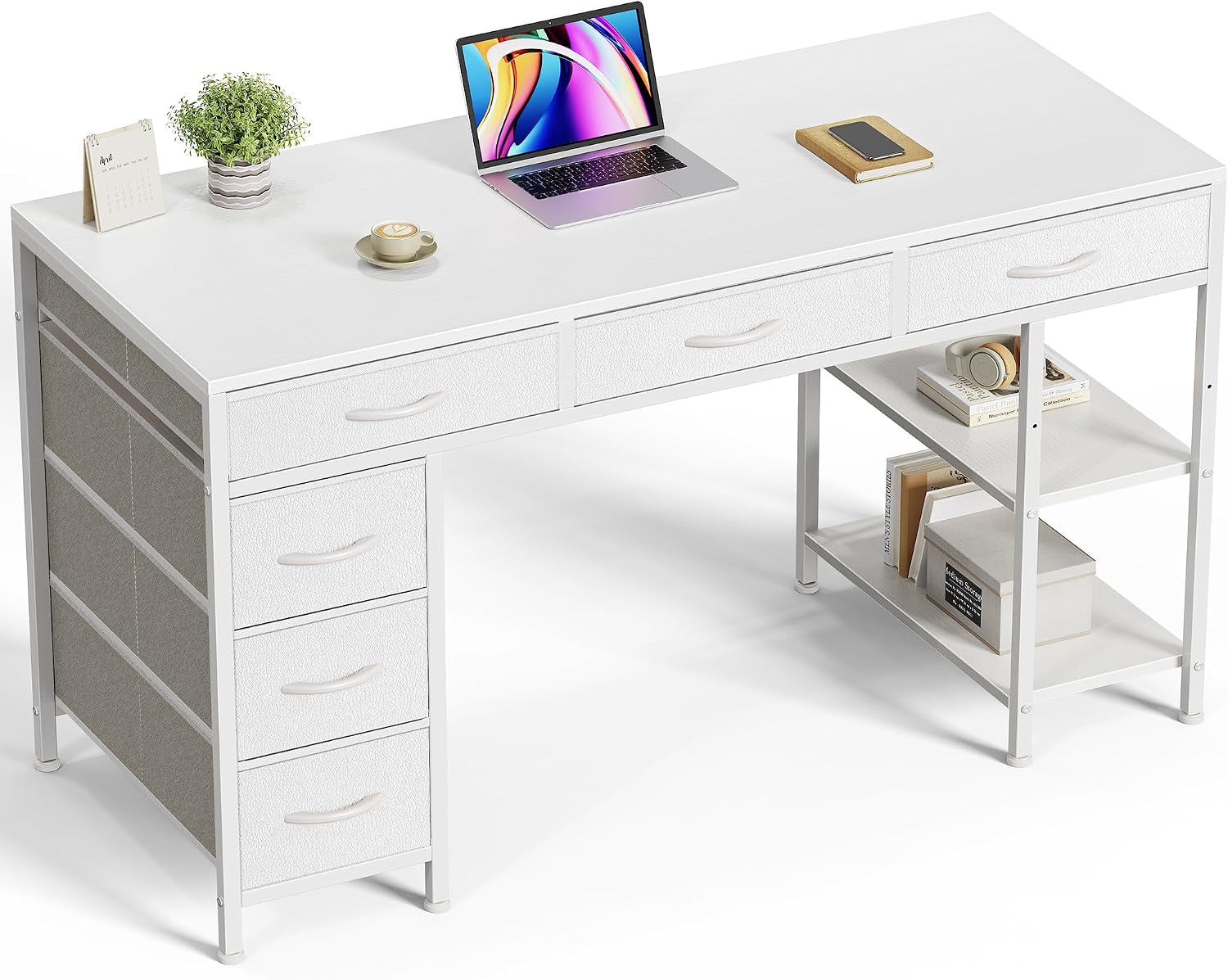 Angled view of the desk in white with six fabric drawers left and two open shelves right, staged with laptop and decor