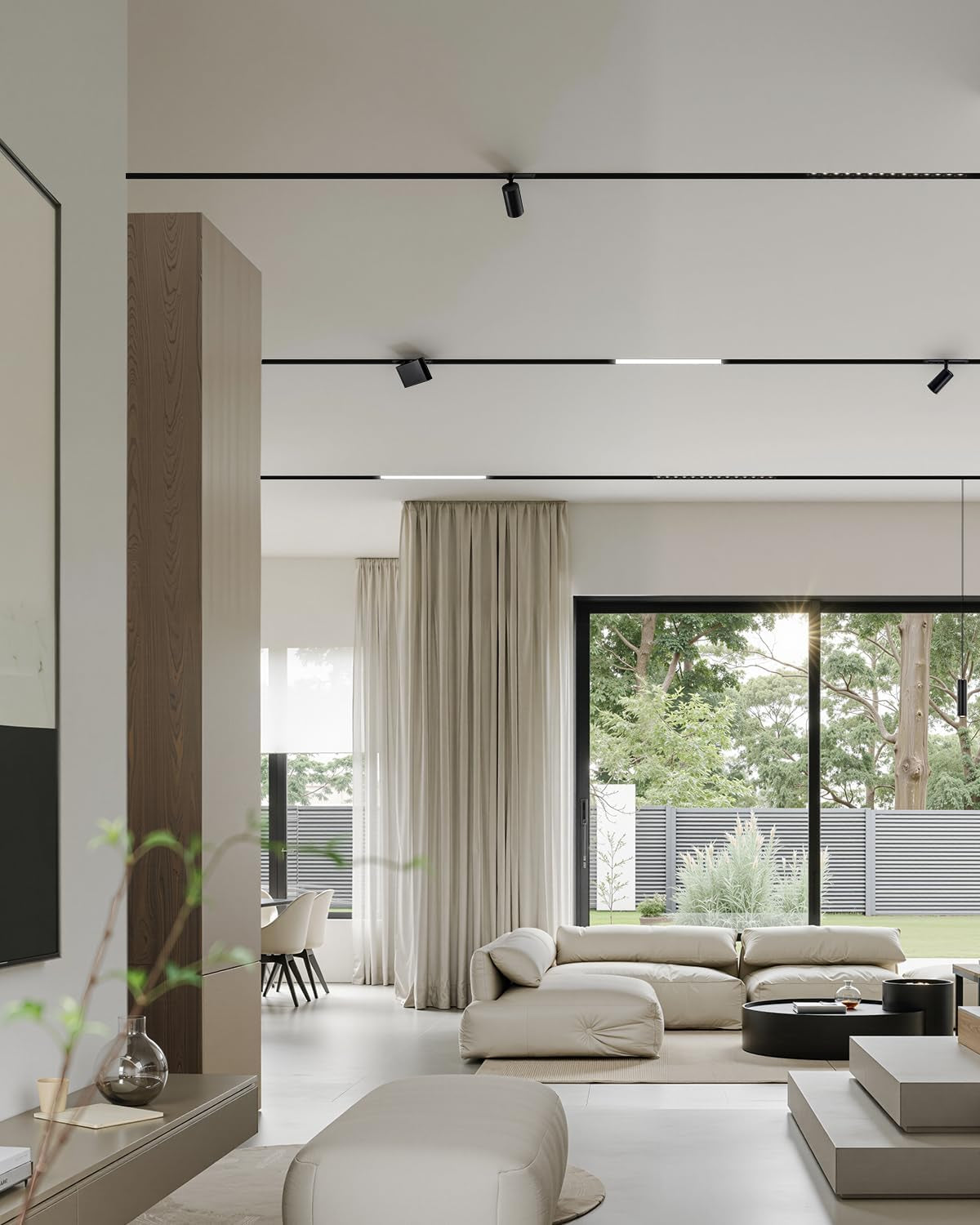 Open-plan living room with multiple black recessed magnetic tracks installed across the ceiling