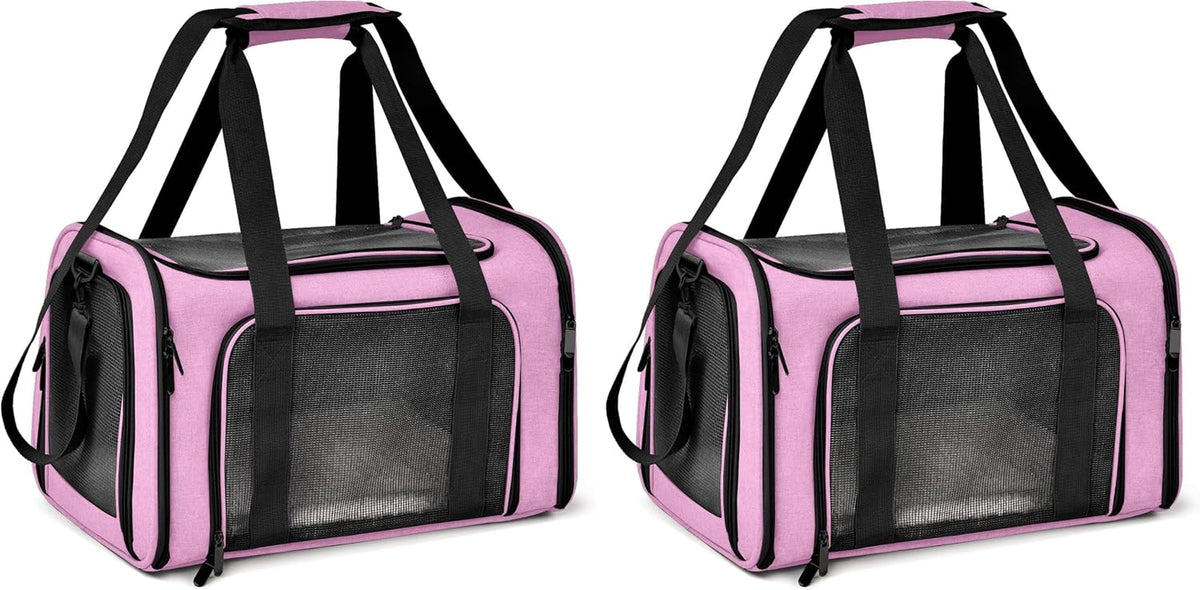 Two identical pink pet carriers side by side showing mesh front panels and top handles.