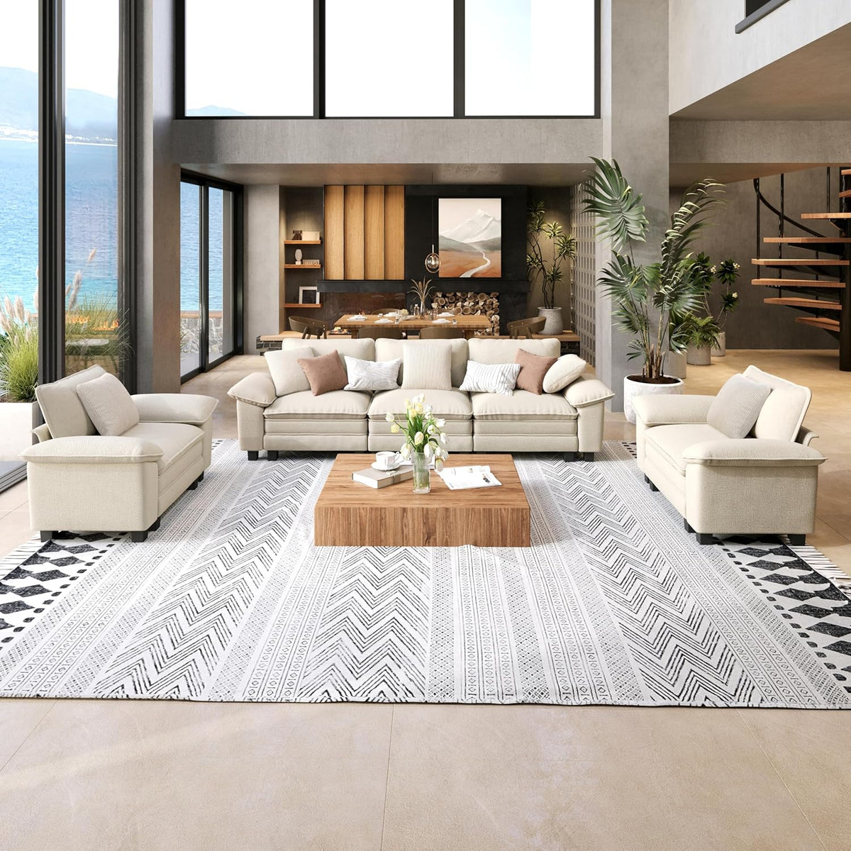 Wide bright living room view with a cream sofa set, two chairs, and a square wooden coffee table.