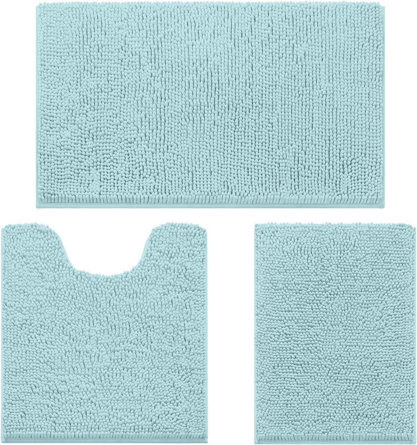 Three light blue chenille bath rugs: large rectangle, U-shaped toilet rug, and square mat on white background