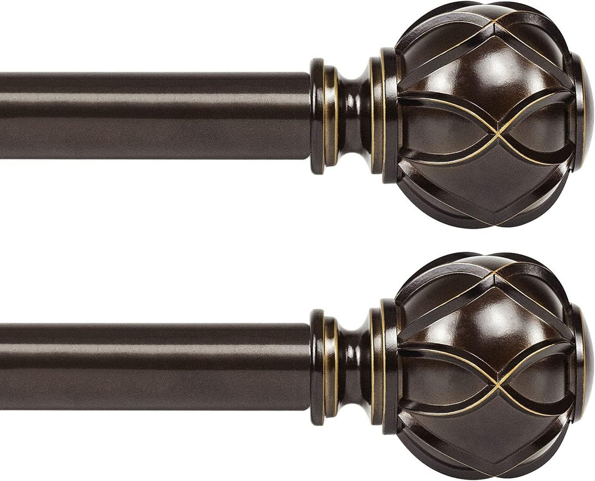 Close-up of two dark brown curtain rods with decorative spherical finials and gold accent lines