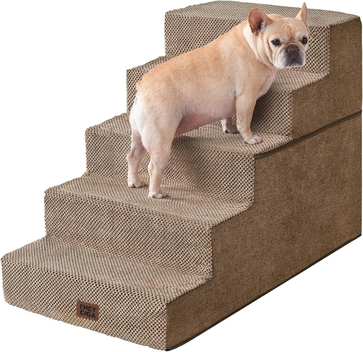 Small tan dog standing on beige textured four-step pet stairs shown at an angle