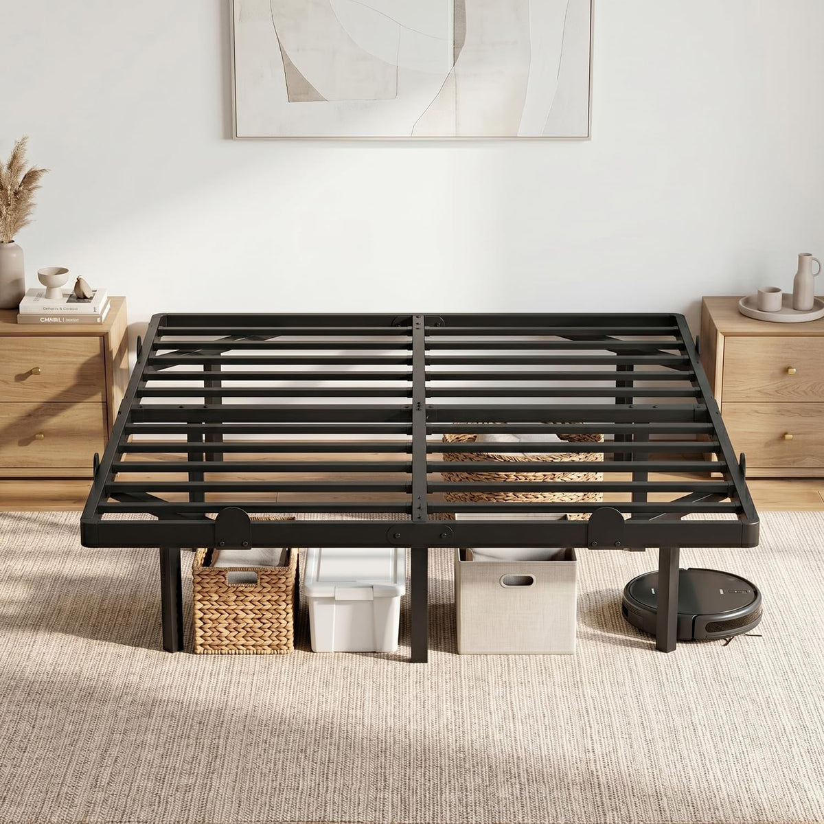 Front view of black metal platform bed frame in a styled bedroom with storage baskets visible under the bed
