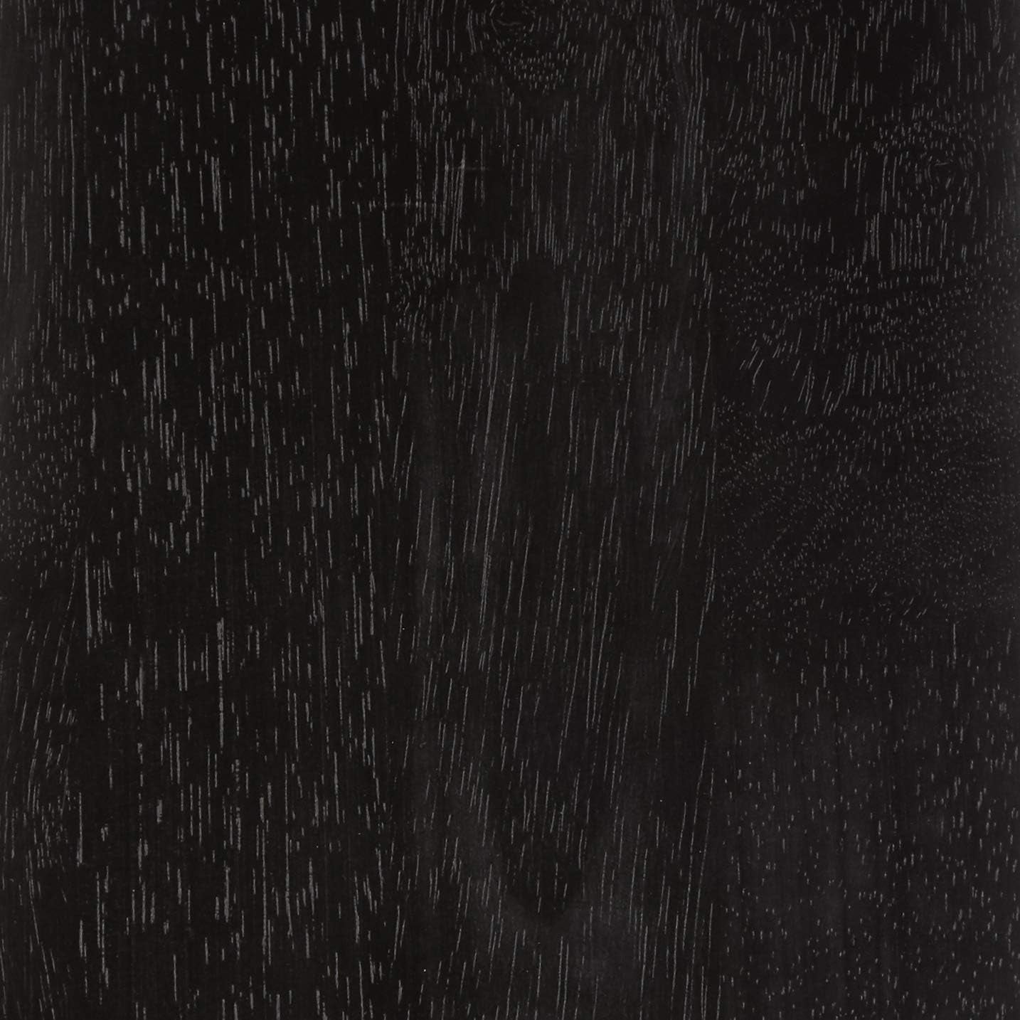 Tight close-up showing the black stained wood grain and texture of the stool's finish.