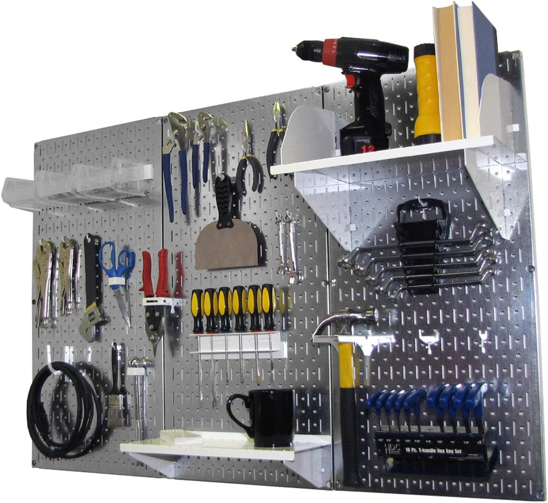 Angled galvanized metal pegboard with white shelves, tools and a coiled cable hung at left.