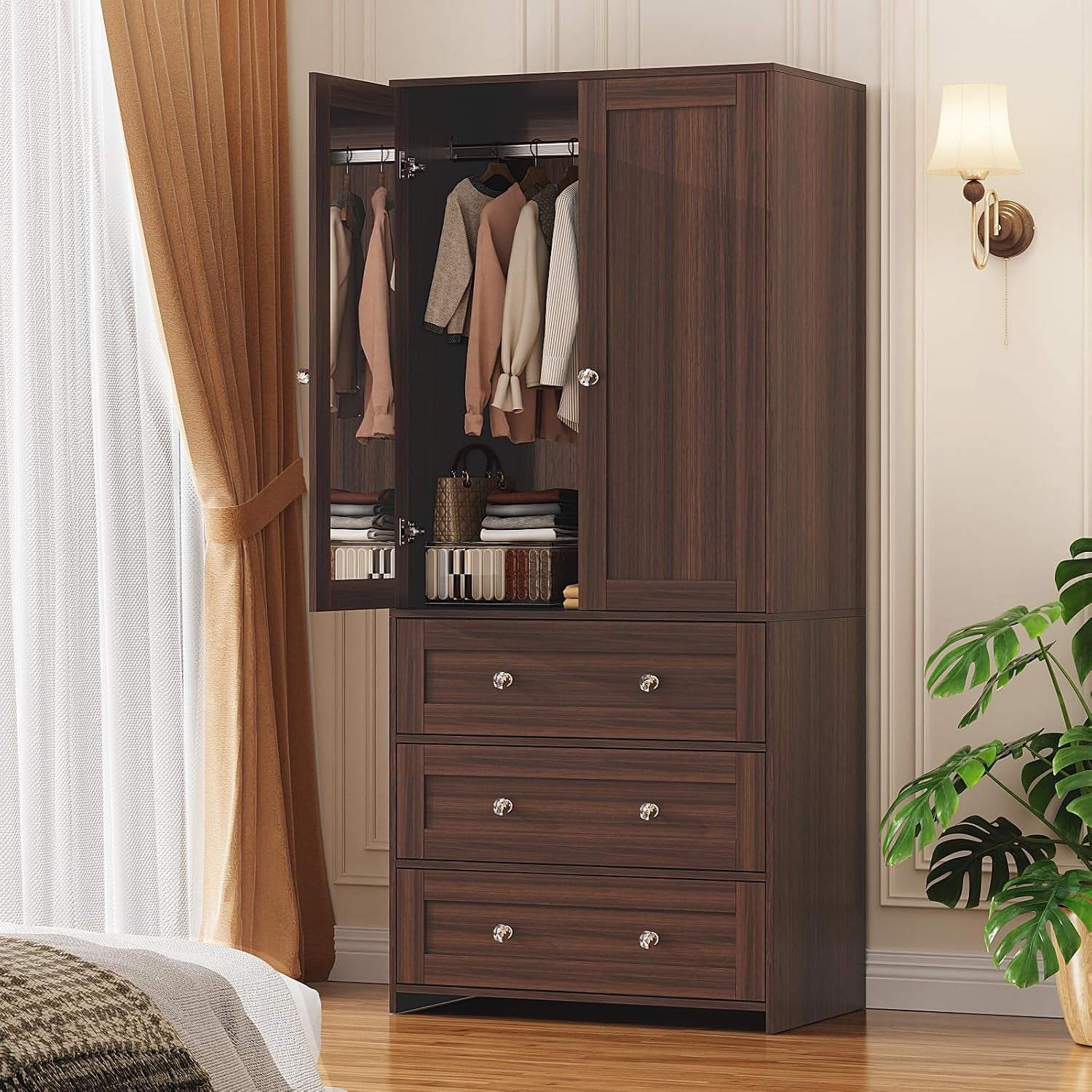 Single tall wardrobe in dark wood with one door open showing hanging clothes and three lower drawers.
