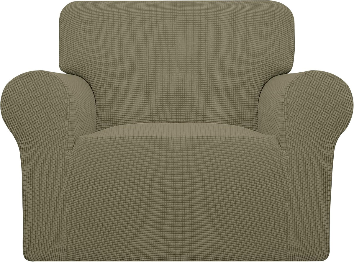 Front view of an armchair covered in a light taupe textured stretch slipcover.