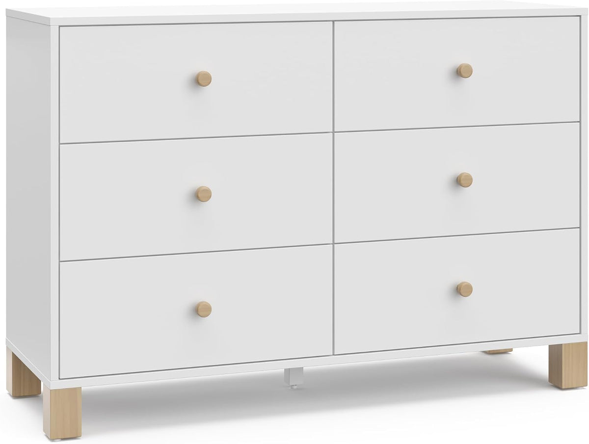 White six-drawer dresser with round wooden knobs and short square wood legs, front view.