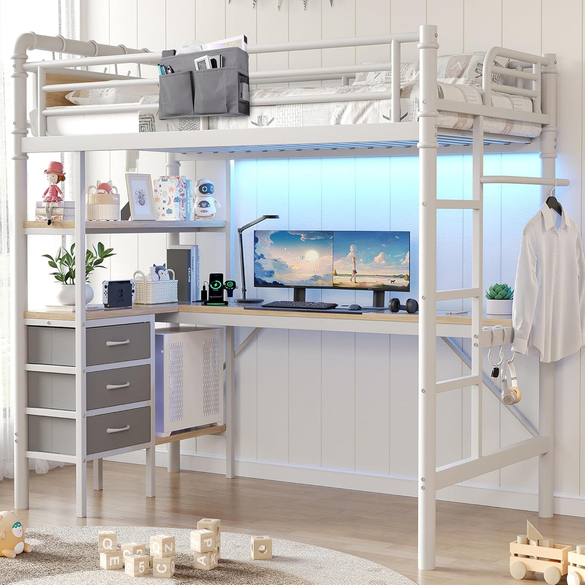 White metal loft bed with gray drawers, toys on shelves and an L-shaped desk lit by blue LED strip.