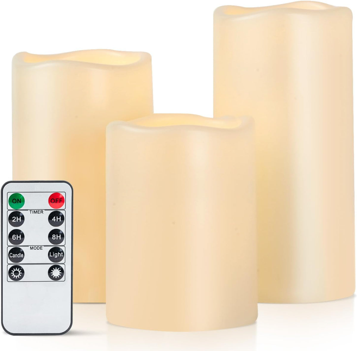Three glowing ivory pillar candles of varying heights arranged together with a remote at the left.