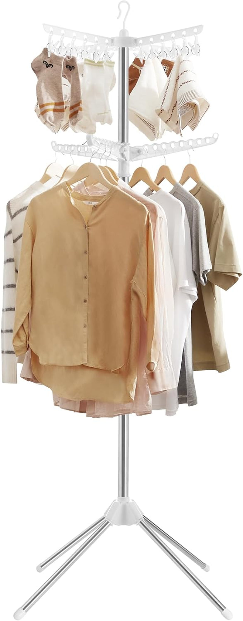 White and silver freestanding clothes drying rack with shirts and socks hung, angled front view