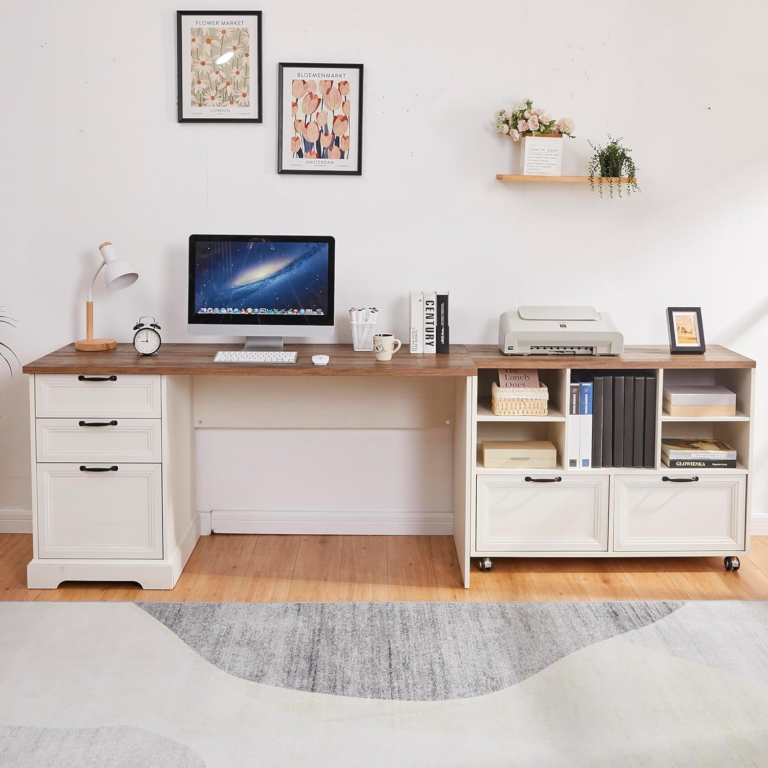 Main room shot of white L-shaped desk with wood top, left drawer pedestal and right storage cabinet on casters.