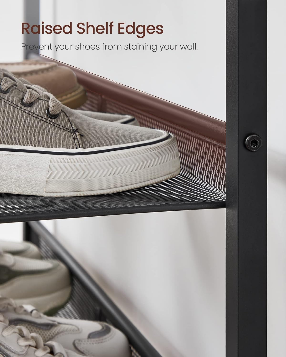 Detail of raised shelf edge and metal frame with a sneaker on the mesh shelf demonstrating the wall-protecting lip