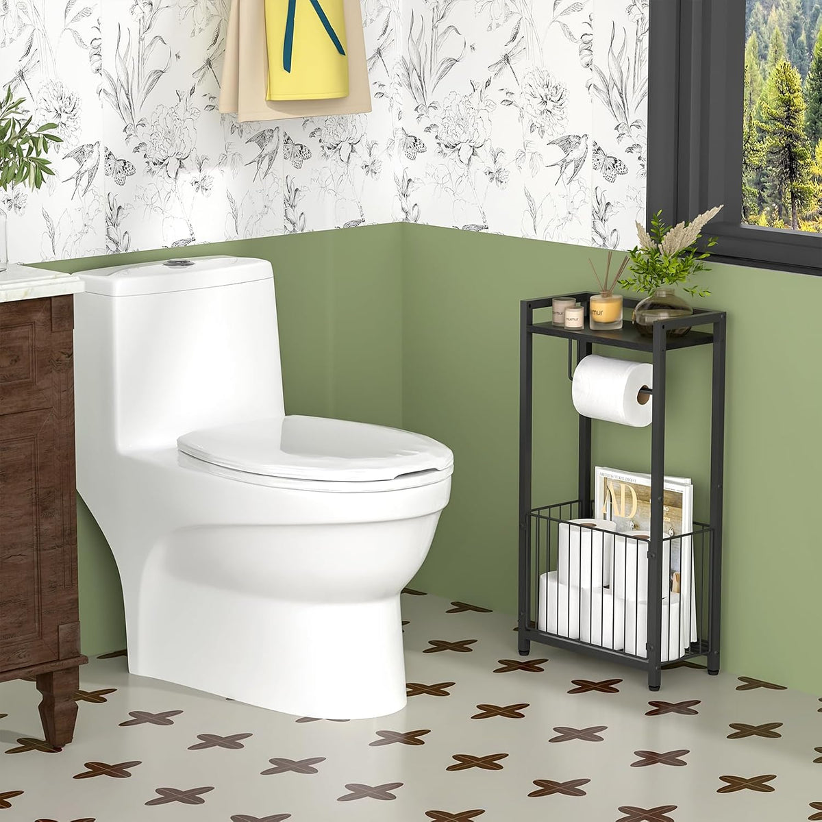 Black freestanding holder beside a toilet showing the top shelf styled with a vase and candles in a bathroom setting
