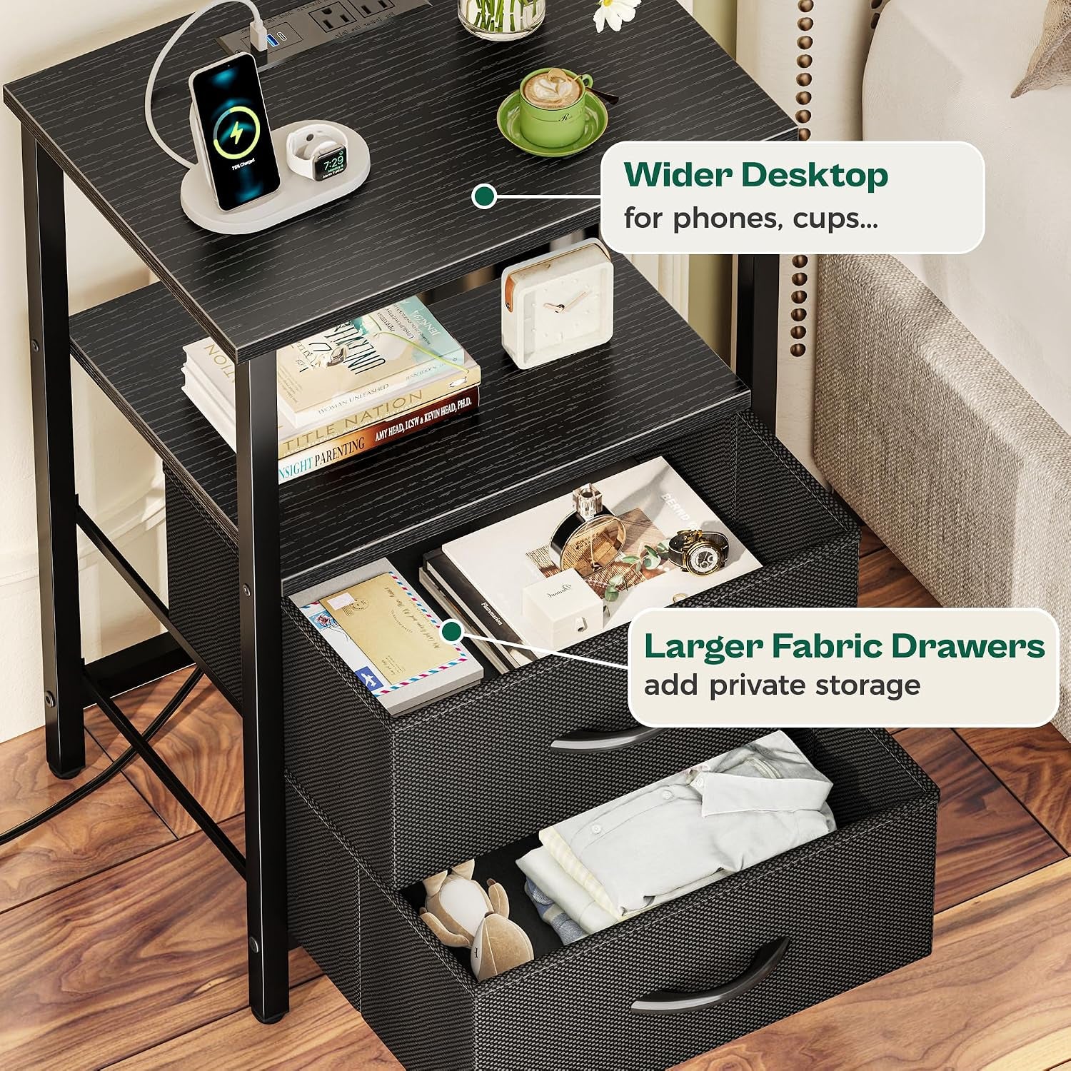 Close-up showing the nightstand's two fabric drawers, one pulled out with folded clothes and small items on the shelf above.