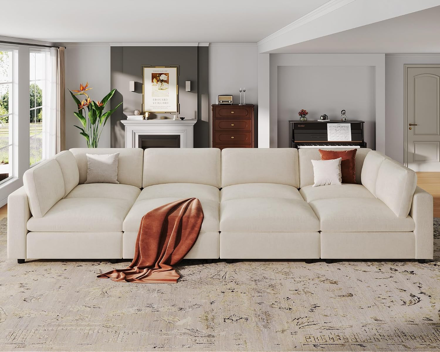 Full-width front shot of the cream modular sofa staged in a bright living room