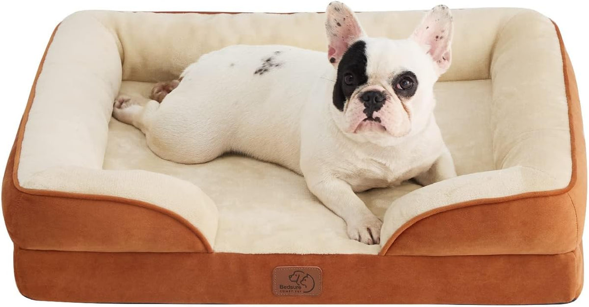 Rust-brown outer bolsters with a cream inner cushion and a white-and-black spotted dog reclining