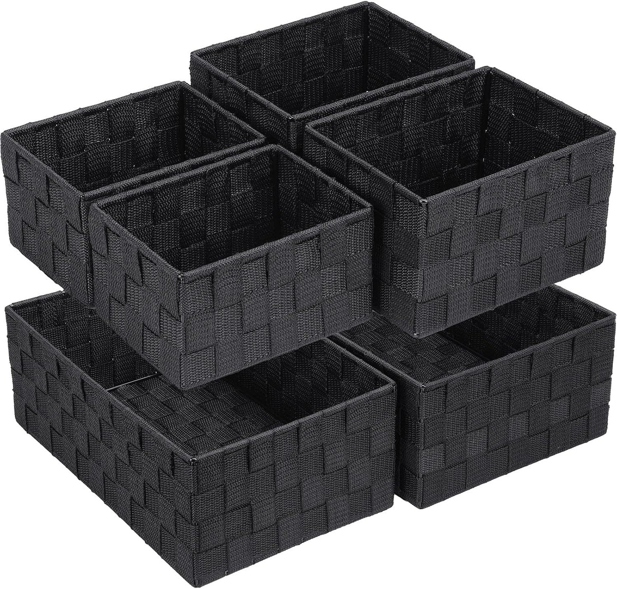 Angled view of six black woven storage baskets stacked in two staggered tiers.