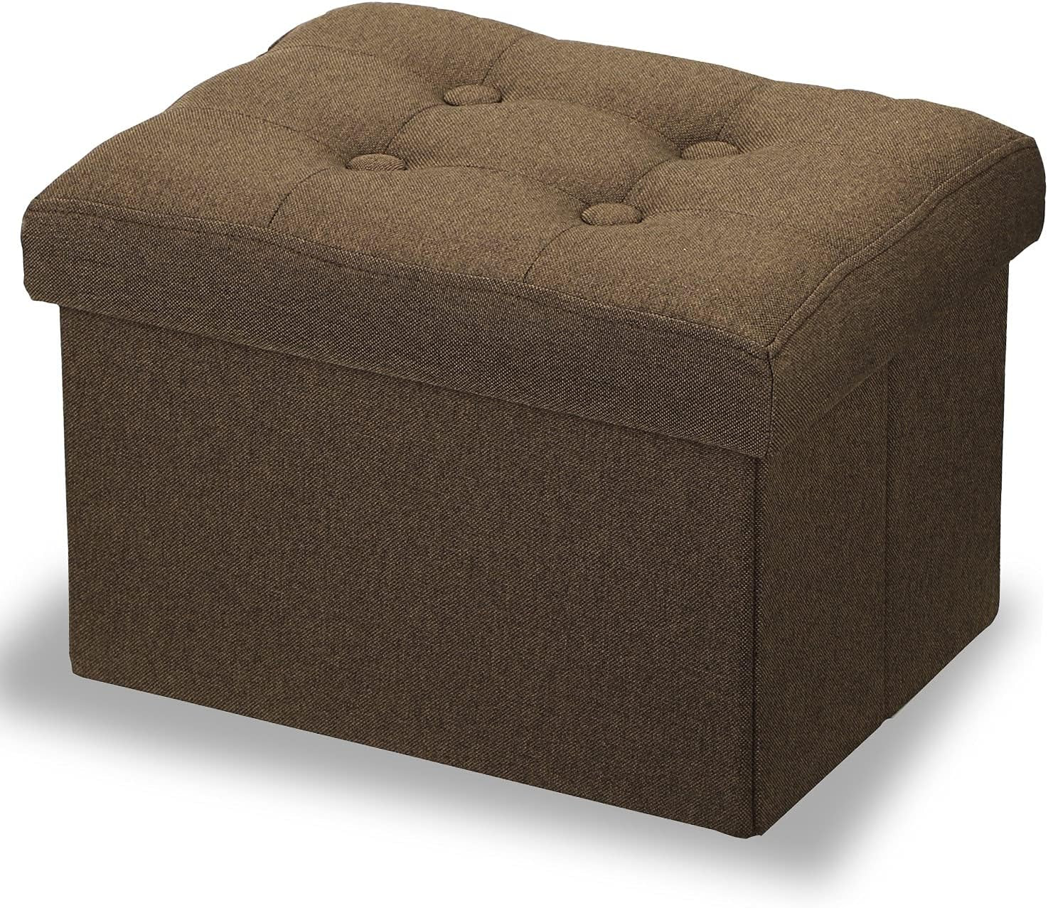 Three-quarter view of a rectangular fabric storage ottoman with a tufted cushioned lid and four buttons.