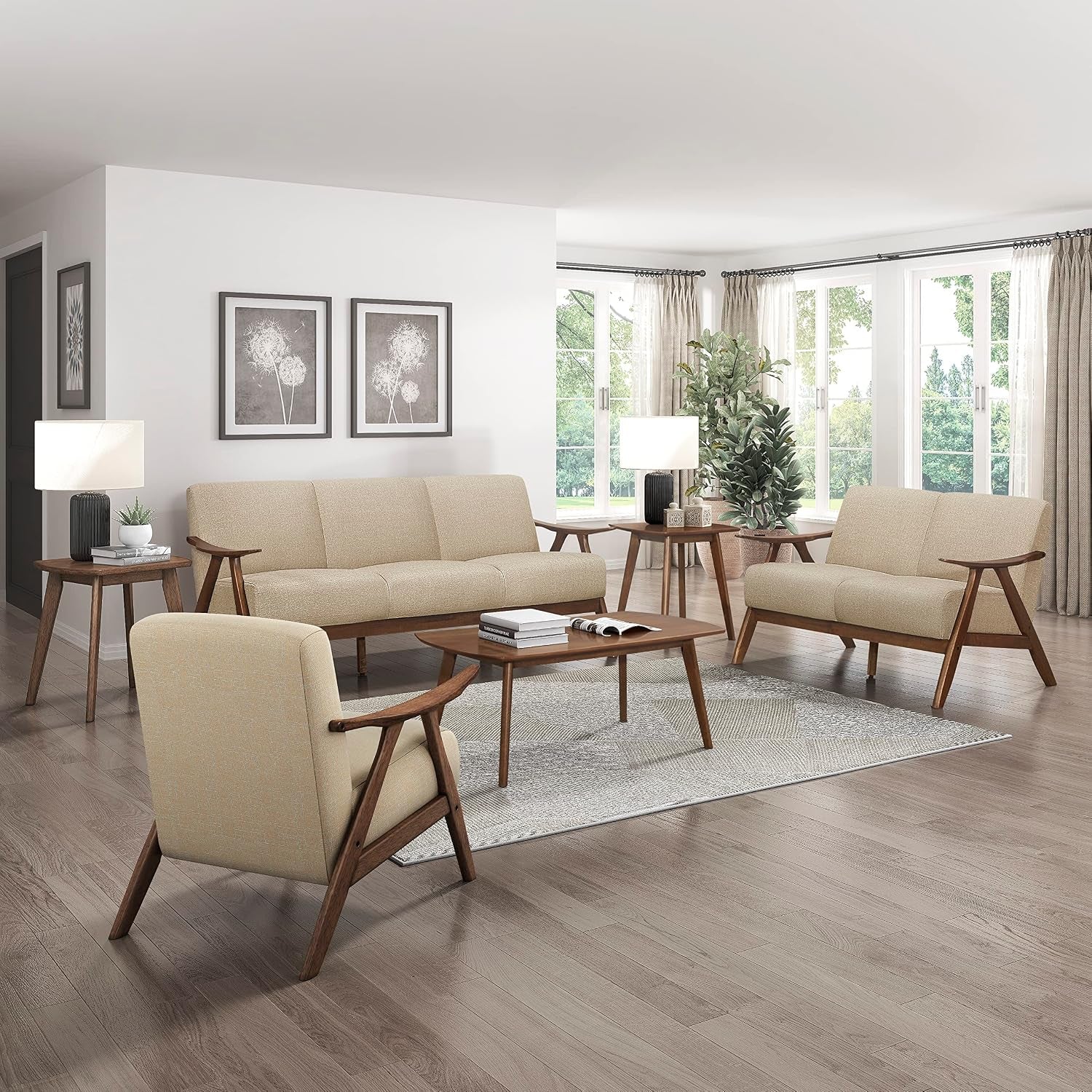 Living room scene with matching sofa, loveseat and the accent chair arranged around a wooden coffee table.