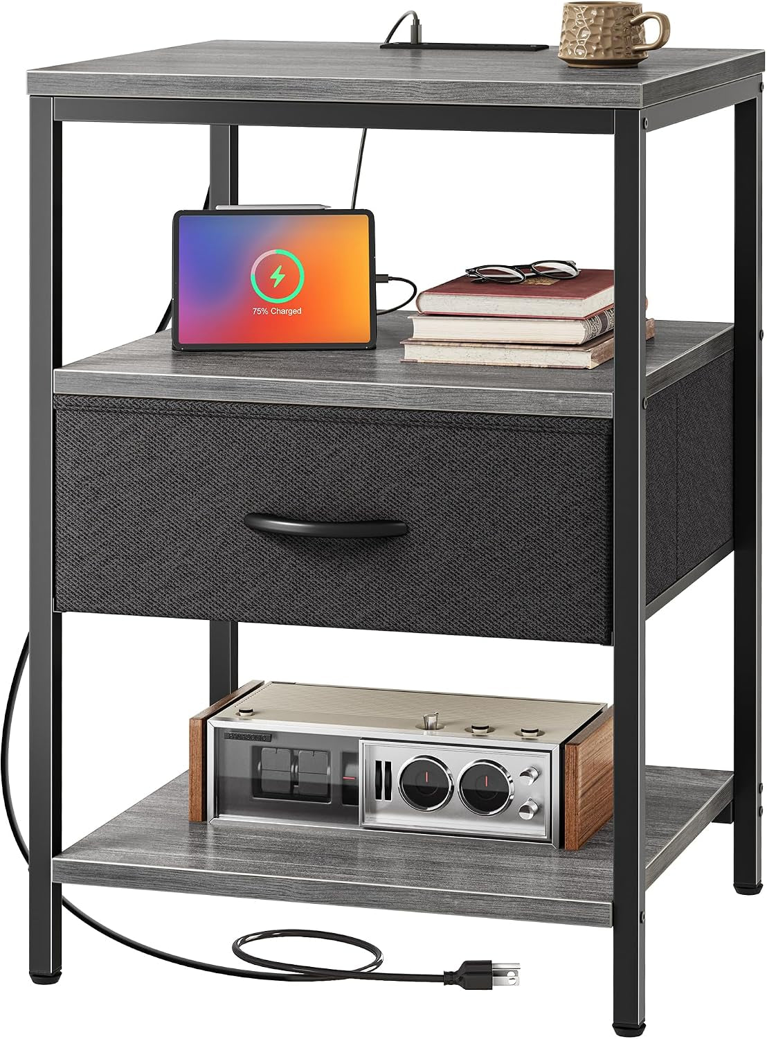 Nightstand with tablet and books on the middle shelf and a radio on the bottom shelf, cord coiled below