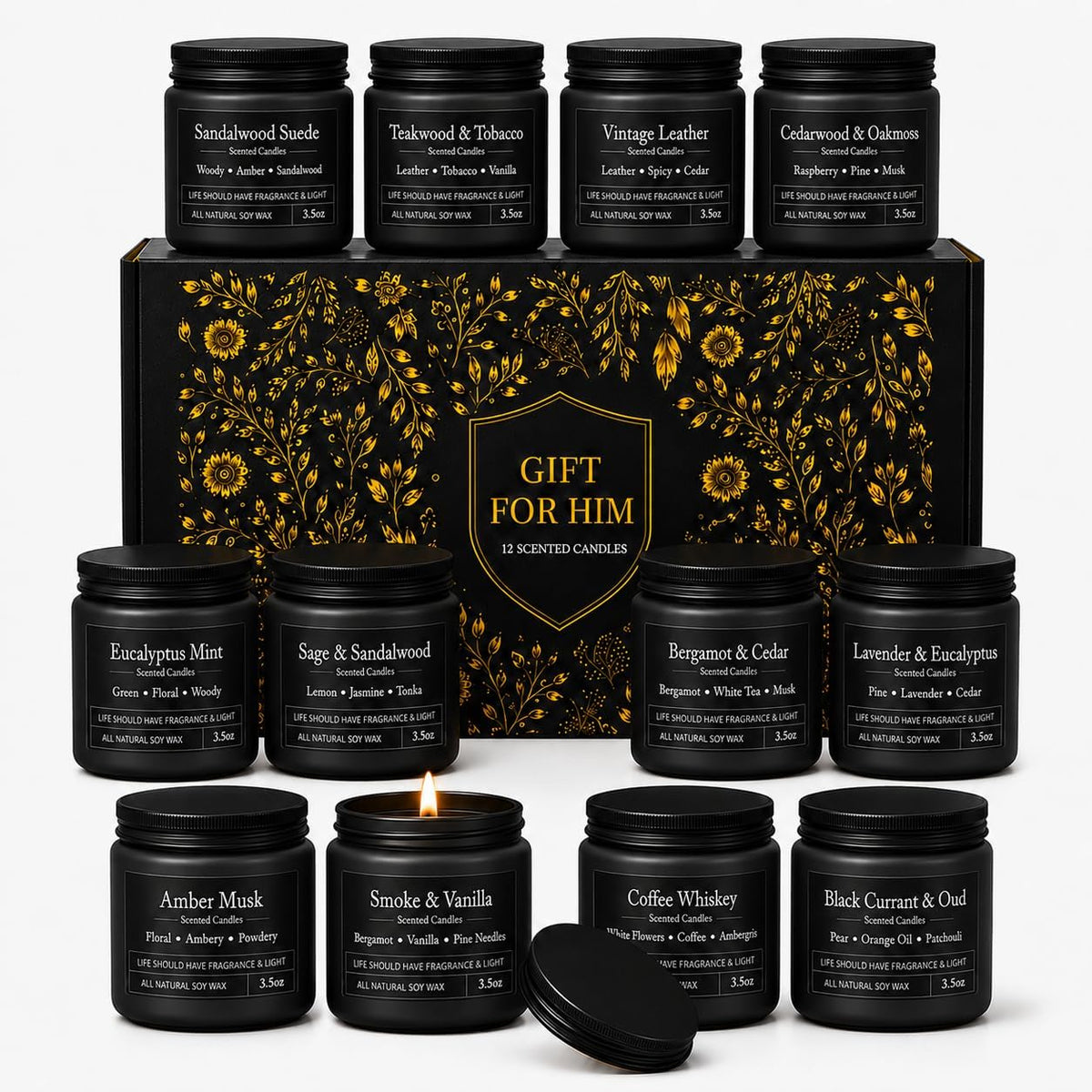 Three rows of black matte jar candles arranged around a decorative black-and-gold gift box; one jar is lit