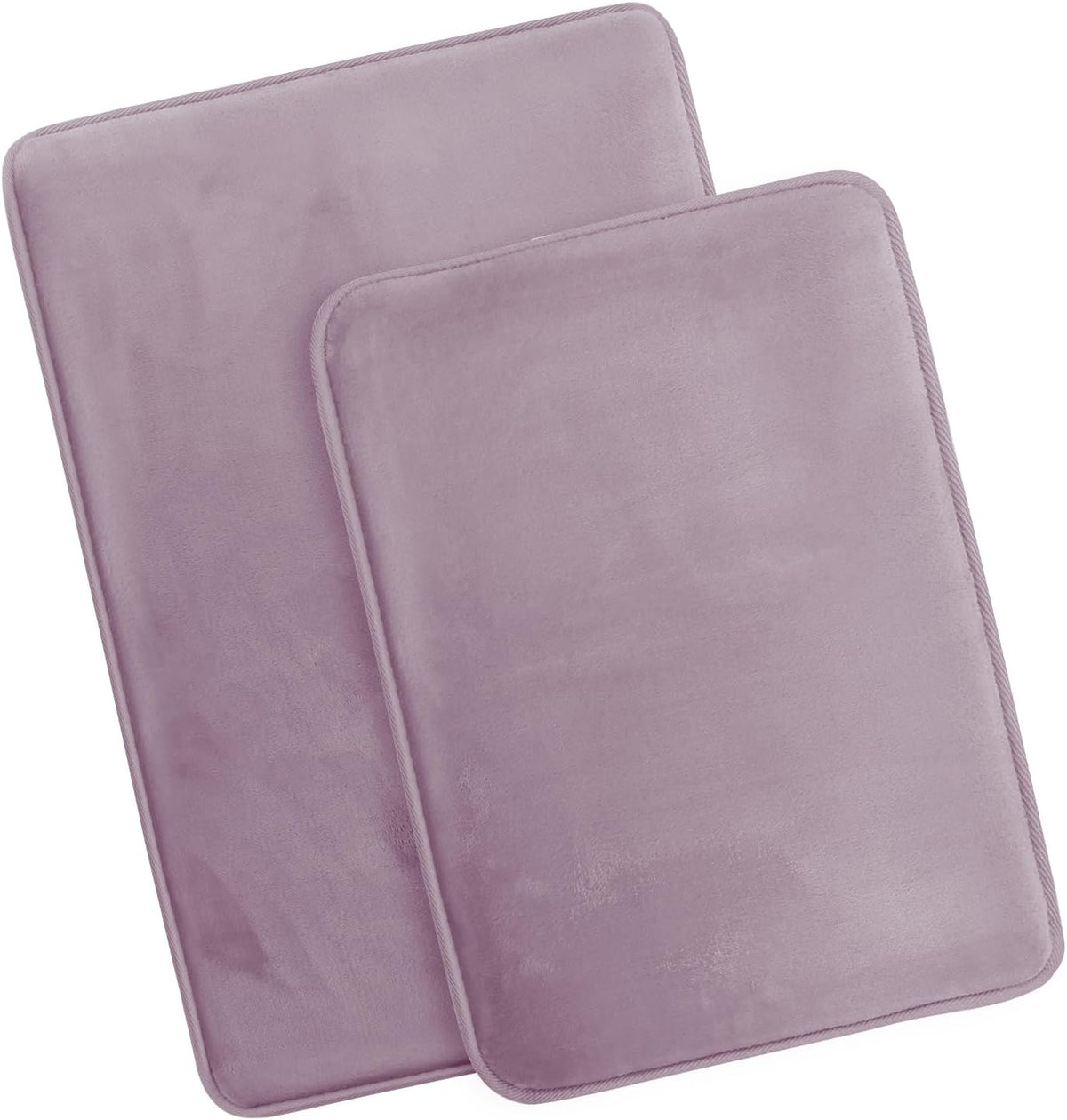 Two lavender rectangular memory-foam rugs overlapped, showing plush pile and stitched rope-edge trim
