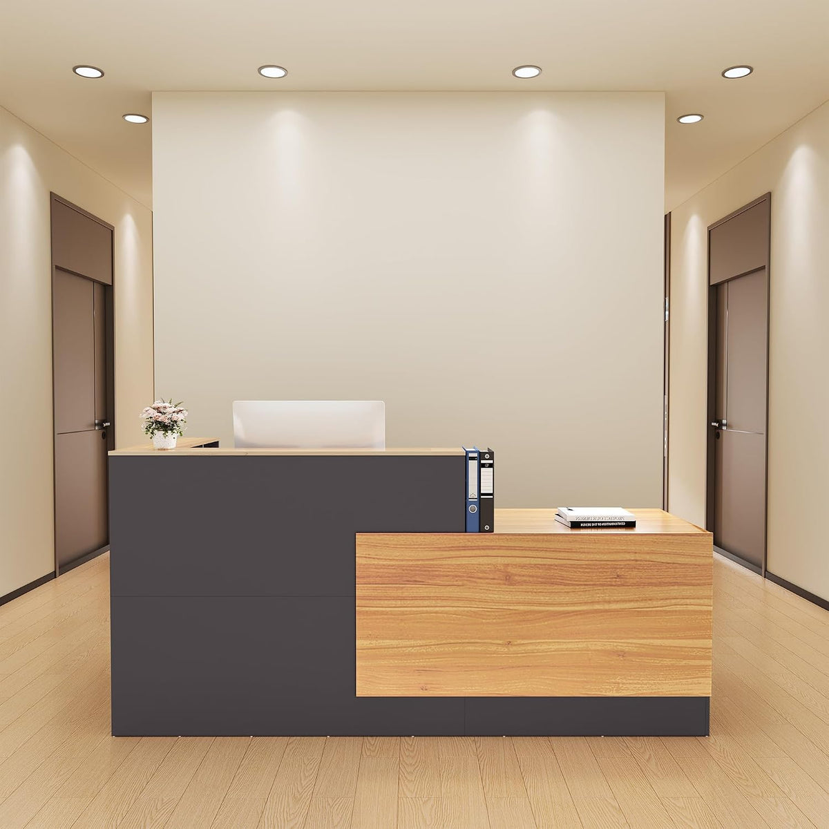 Reception desk in slate gray with walnut return set in a neutral hallway with recessed ceiling lights