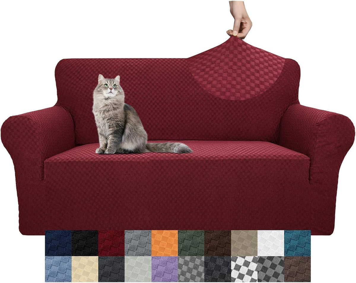 Burgundy three-seat sofa cover shown front-on with a gray cat sitting and color sample thumbnails along the bottom
