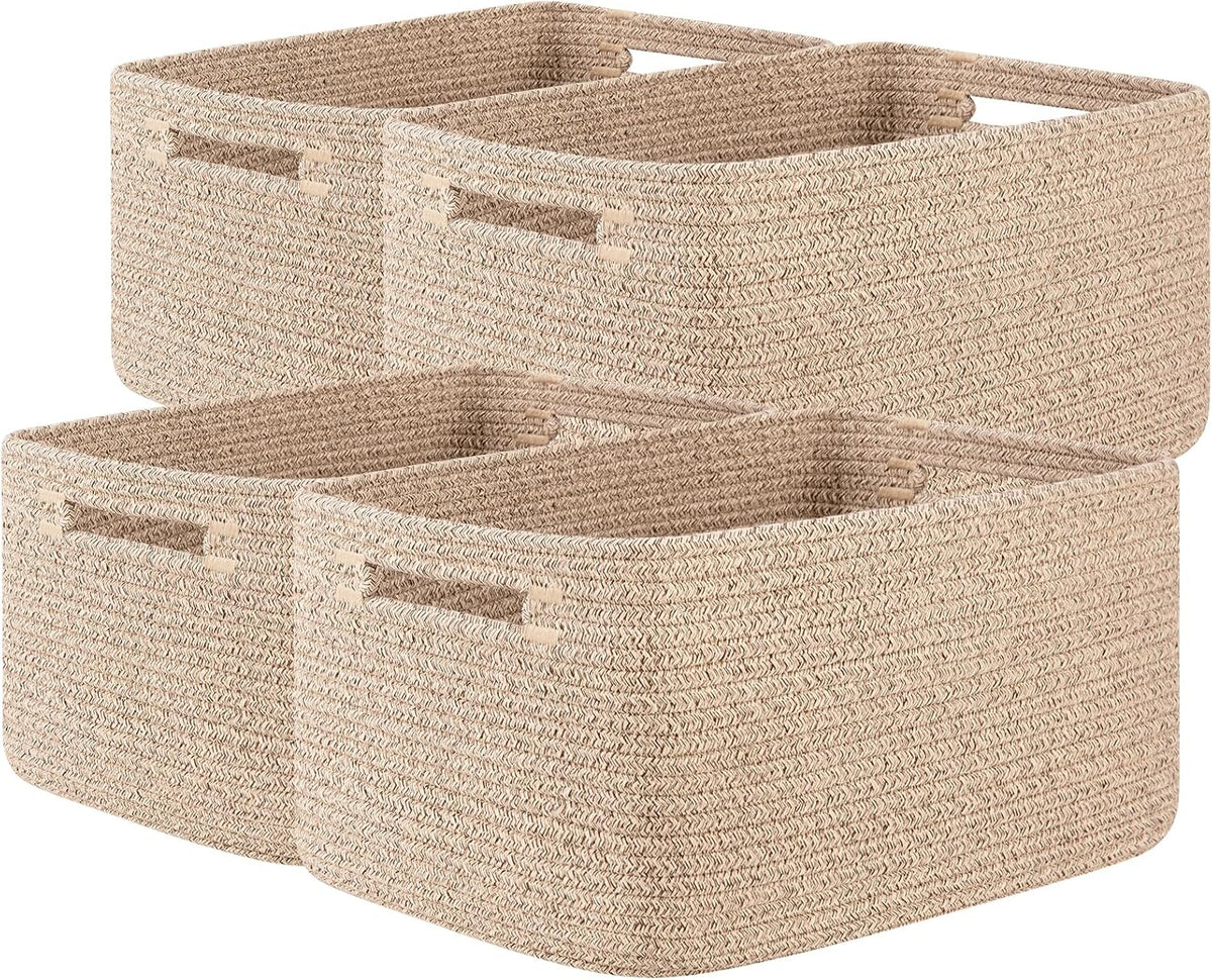 Four natural beige woven rope baskets pictured together showing rounded corners and texture.