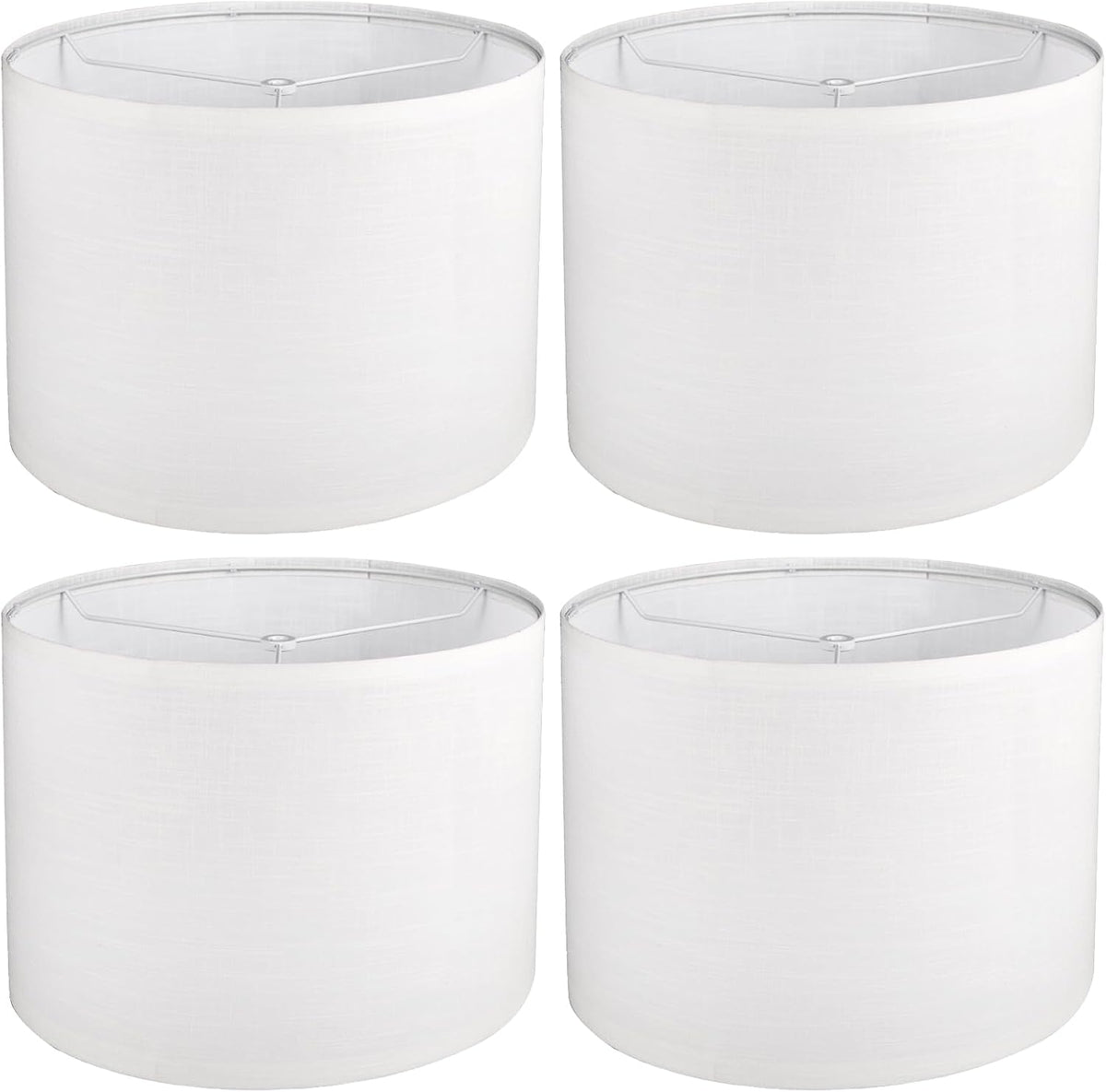 Four white drum shades arranged in a 2x2 grid on a white background, showing their uniform shape and top openings.