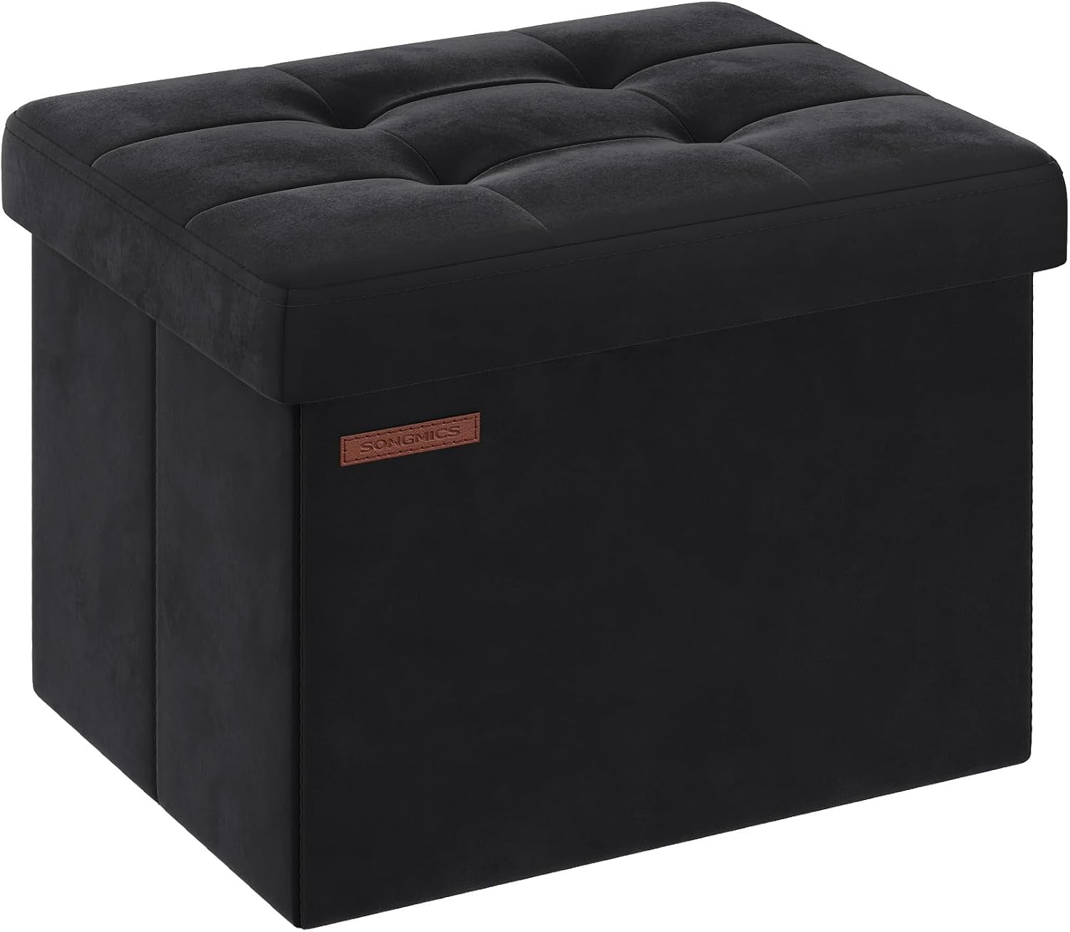 Three-quarter view of a dark charcoal tufted storage ottoman with a stitched top and small rectangular tag.
