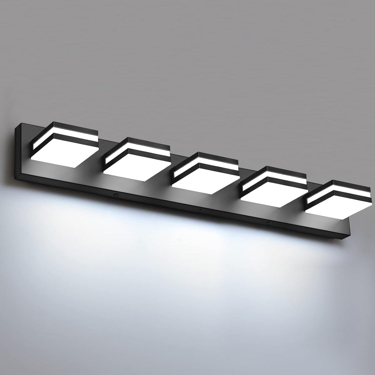 Angled close view of a five-light rectangular vanity bar with black finish