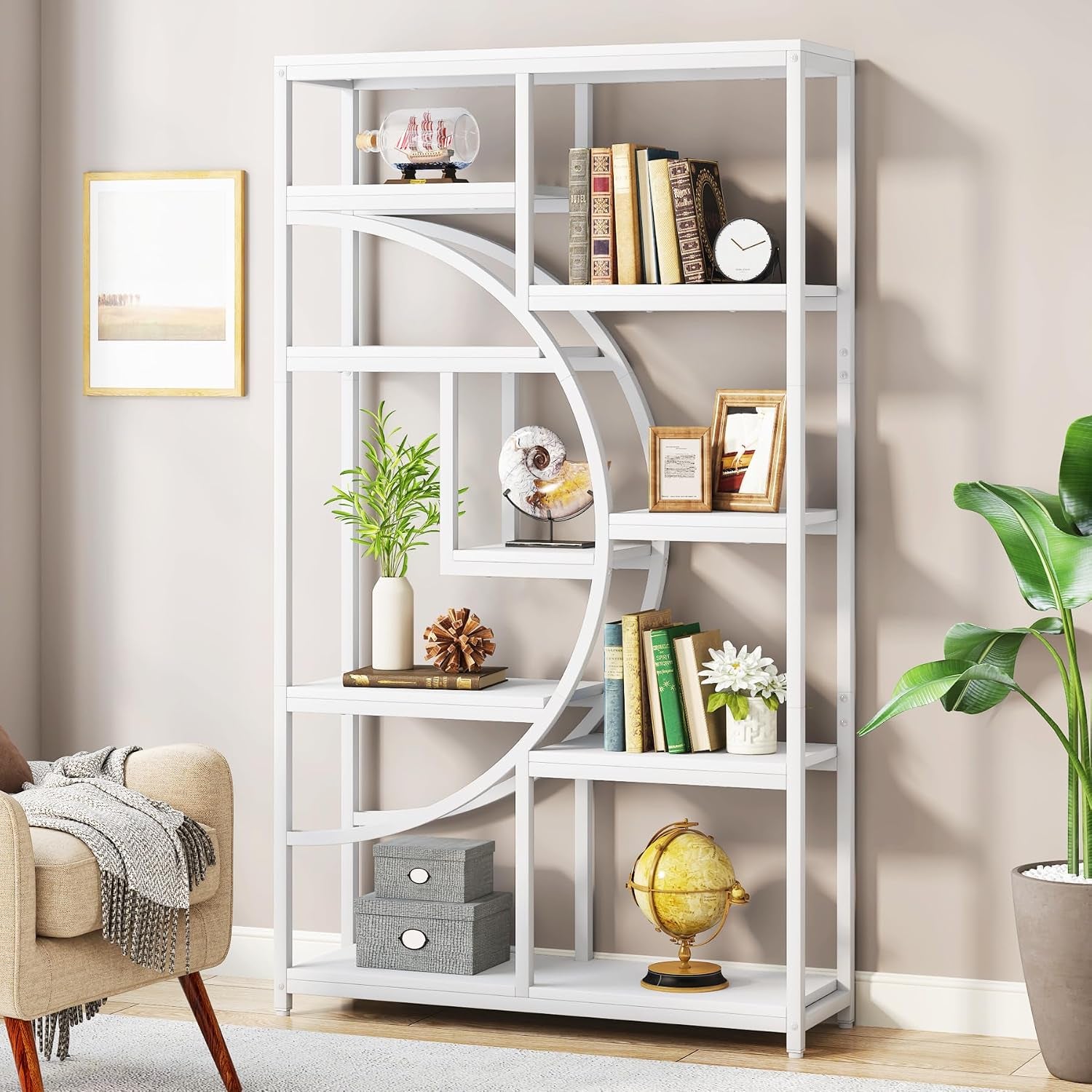 Straight-on view of a white metal bookshelf with semicircular inner frame and decorative objects