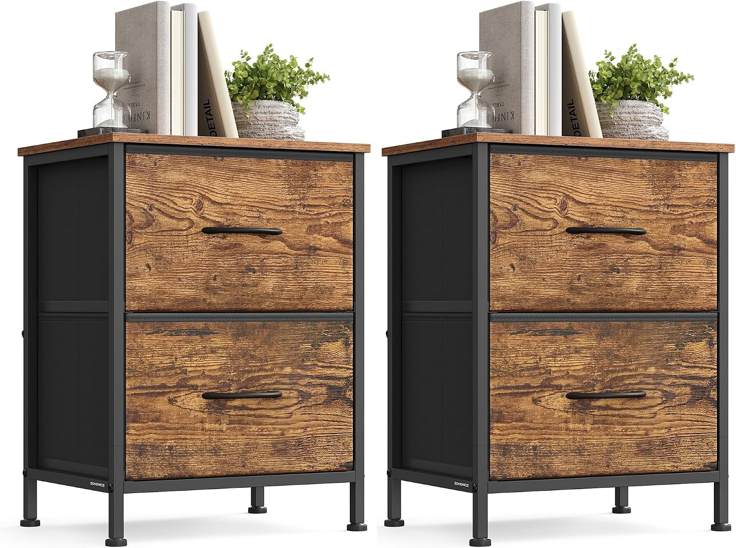 Two identical wood-front bedside chests with black frames, each topped with books and a plant