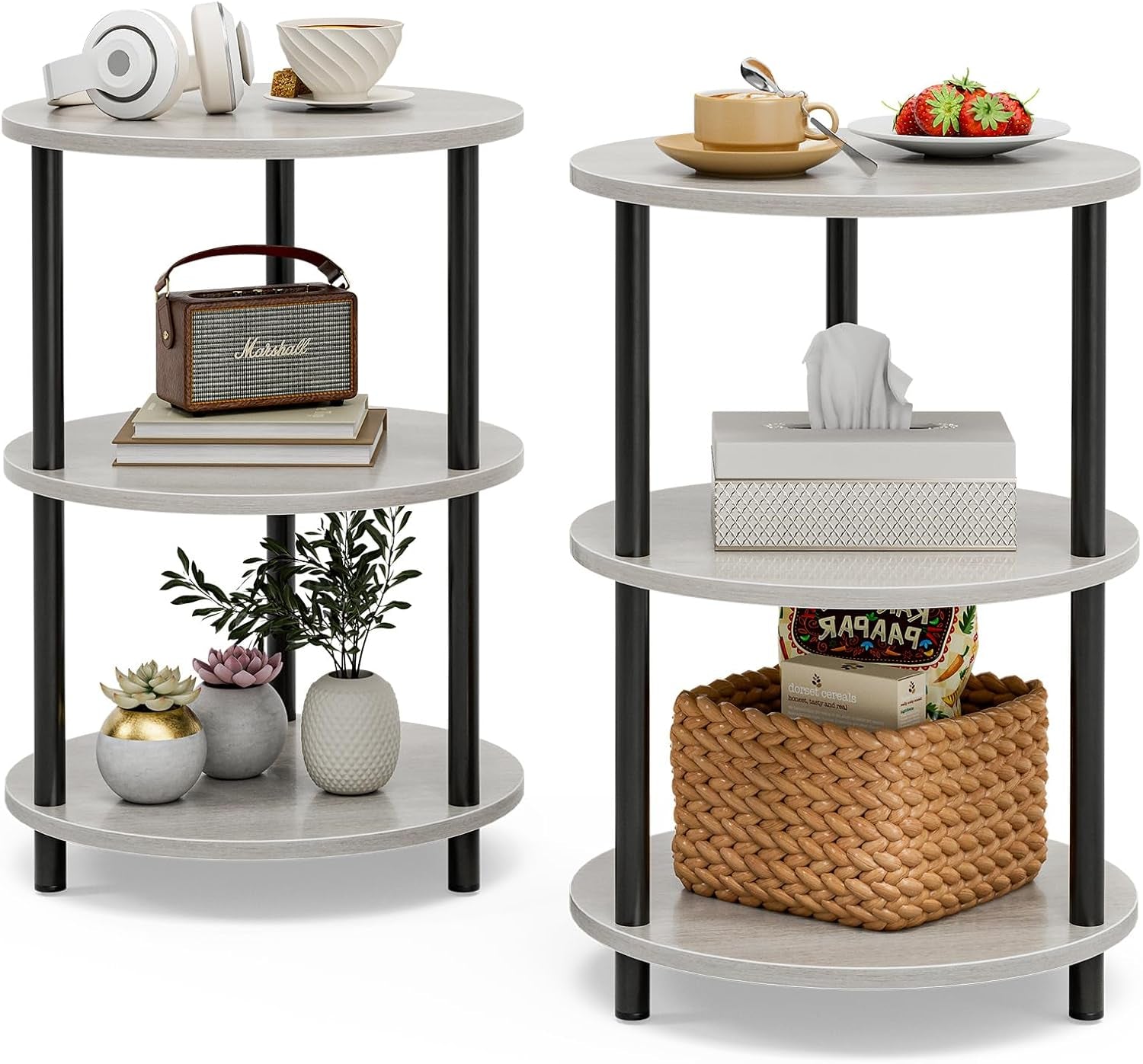 Two three-tier round side tables with light gray tops and black legs shown side by side with decor and storage props.