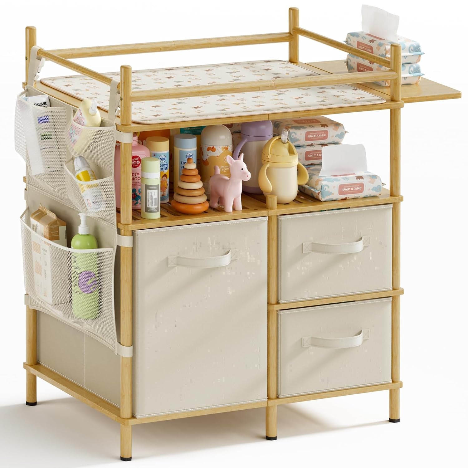 Front three-quarter view of bamboo changing table with cream fabric drawers, mesh side pockets and floral changing pad.